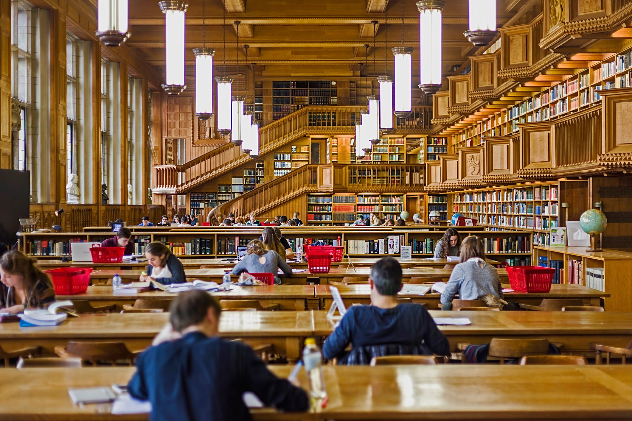 Students studying inside the library of the university of Leuven, Belgium