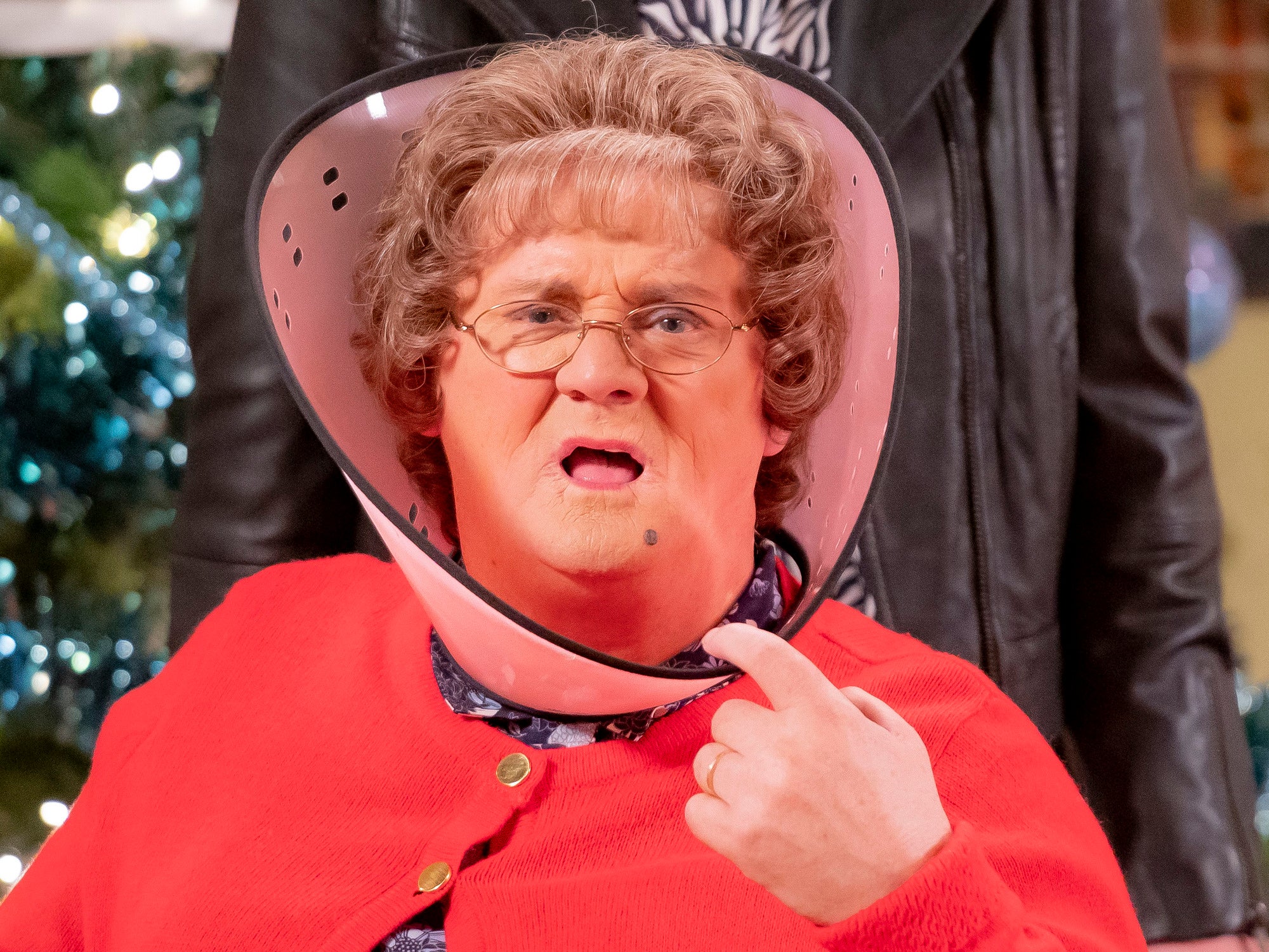 Liable to irritate: Agnes Brown (Brendan O’Carroll) is fitted with a protective cone in the Mrs Brown’s Boys Christmas special