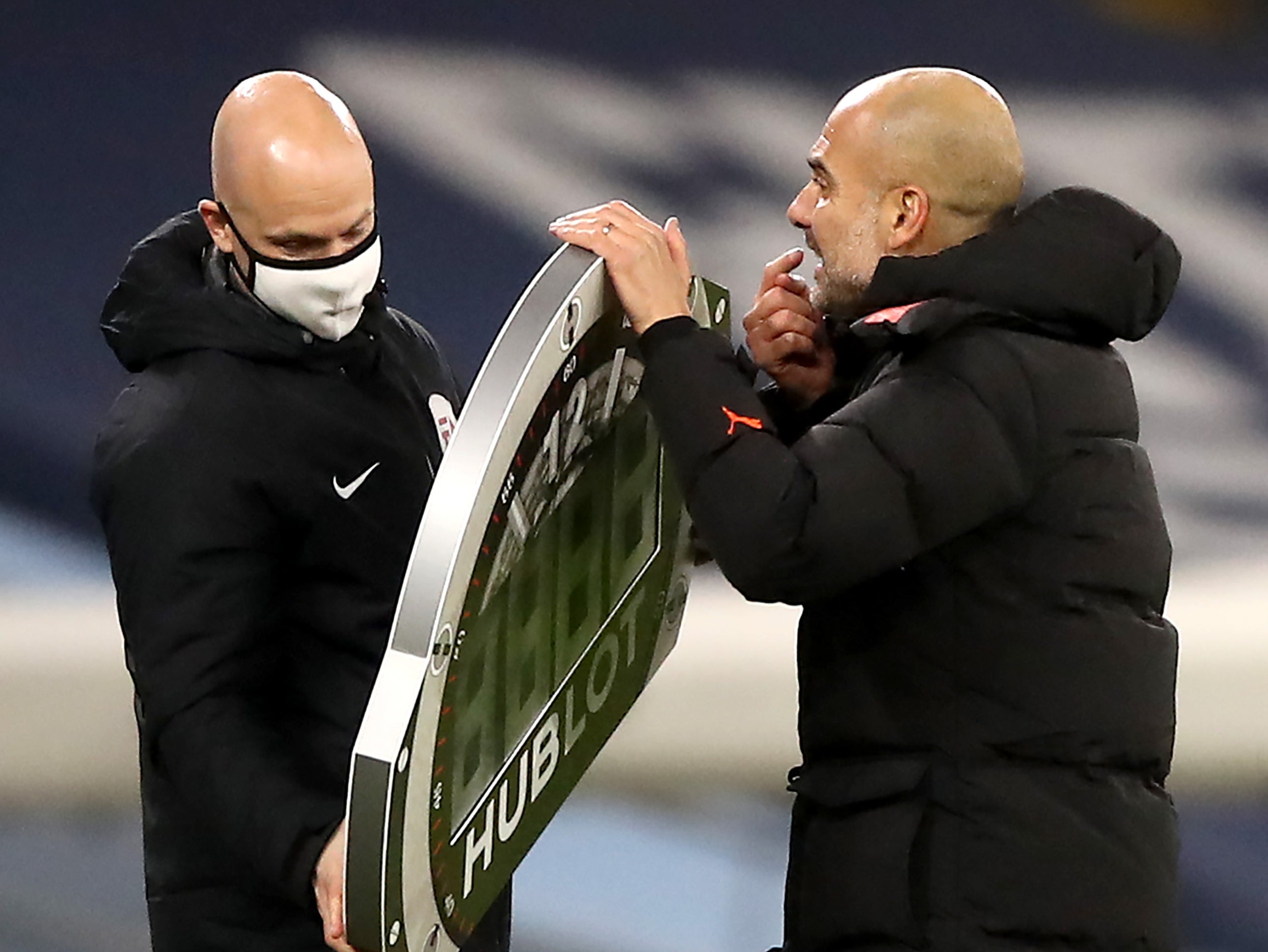 Pep Guardiola remonstrates with fourth official Anthony Taylor
