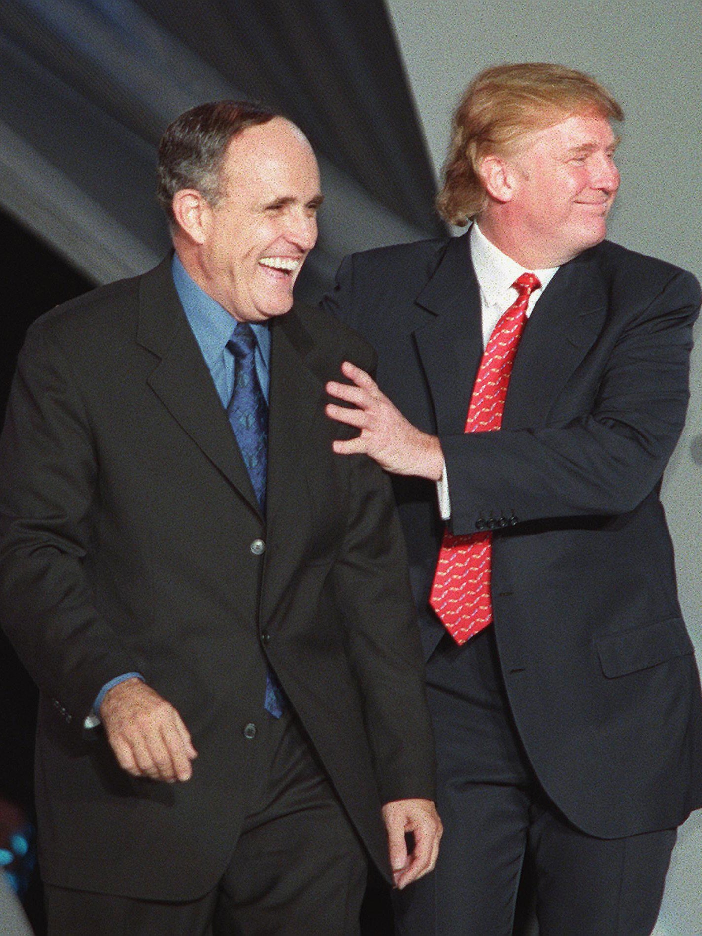 The terrible twosome: Giuliani and Trump walk down the runway during the NYC2000 fashion show
