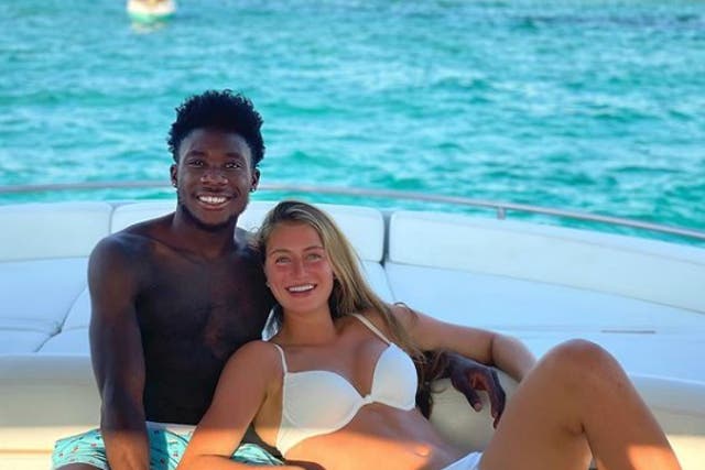 <p>Alphonso Davies was on holiday in Ibiza with his girlfriend Jordyn Huitema</p>