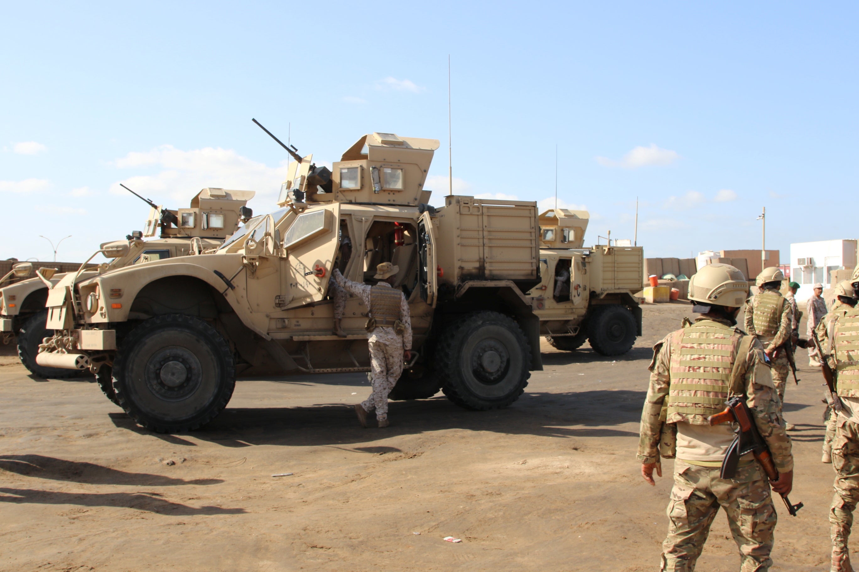 Saudi military personnel at the gate of the Saudi-led coalition’s base in Aden, Yemen
