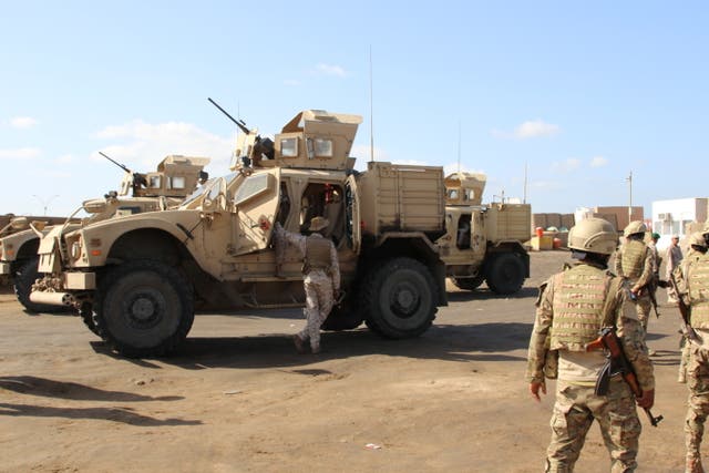 <p>Saudi military personnel at the gate of the Saudi-led coalition’s base in Aden, Yemen</p>