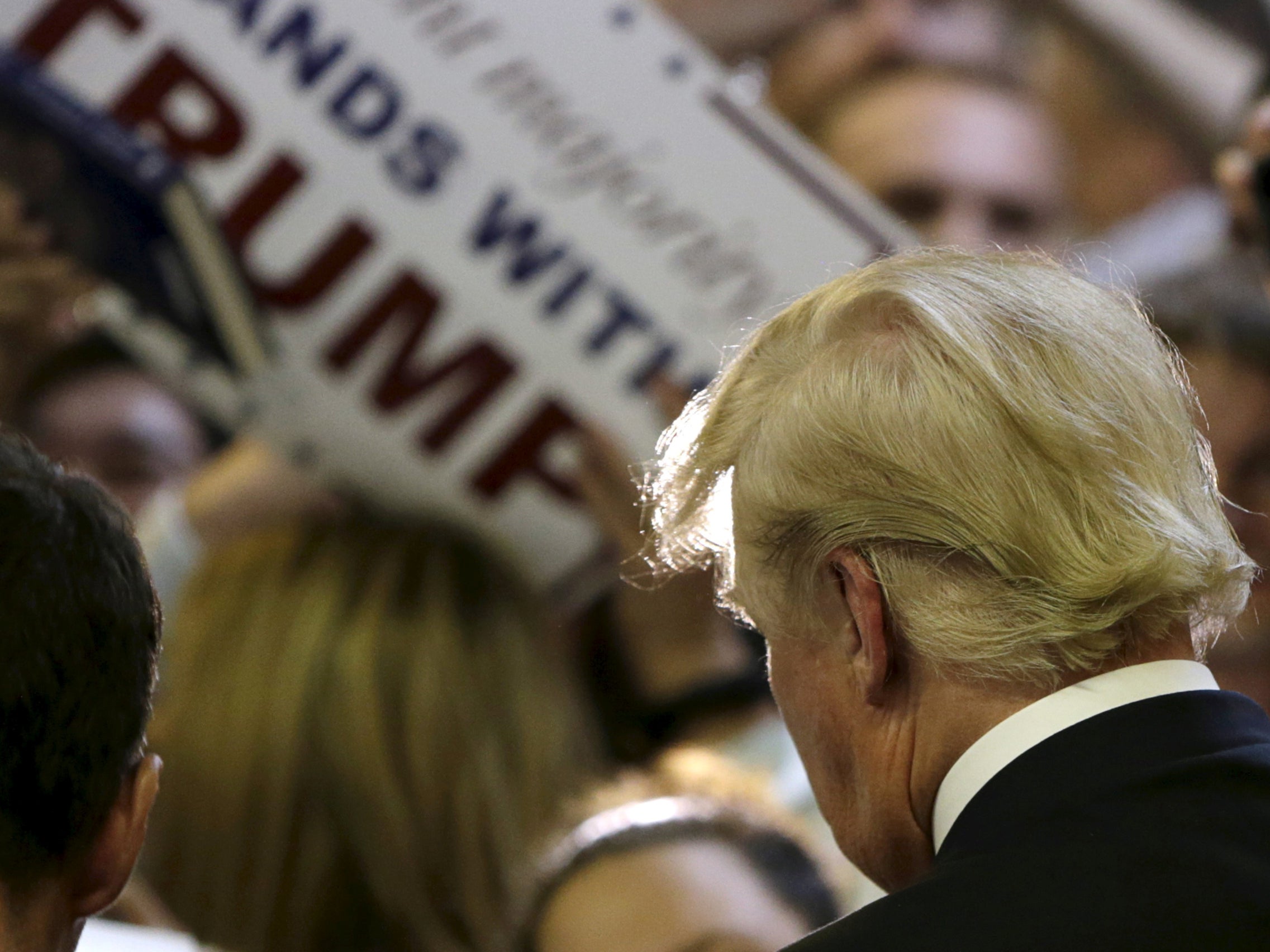 The book says the former president would cut his hair himself using a ‘a huge pair of scissors’