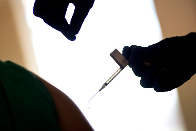 APTOPIX Virus Outbreak Vaccine Rhode Island
