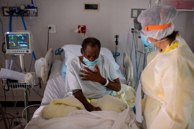 <p>A healthcare worker tends to a patient in the Covid-19 Unit at United Memorial Medical Center in Houston, Texas on July 2, 2020.&nbsp;</p>