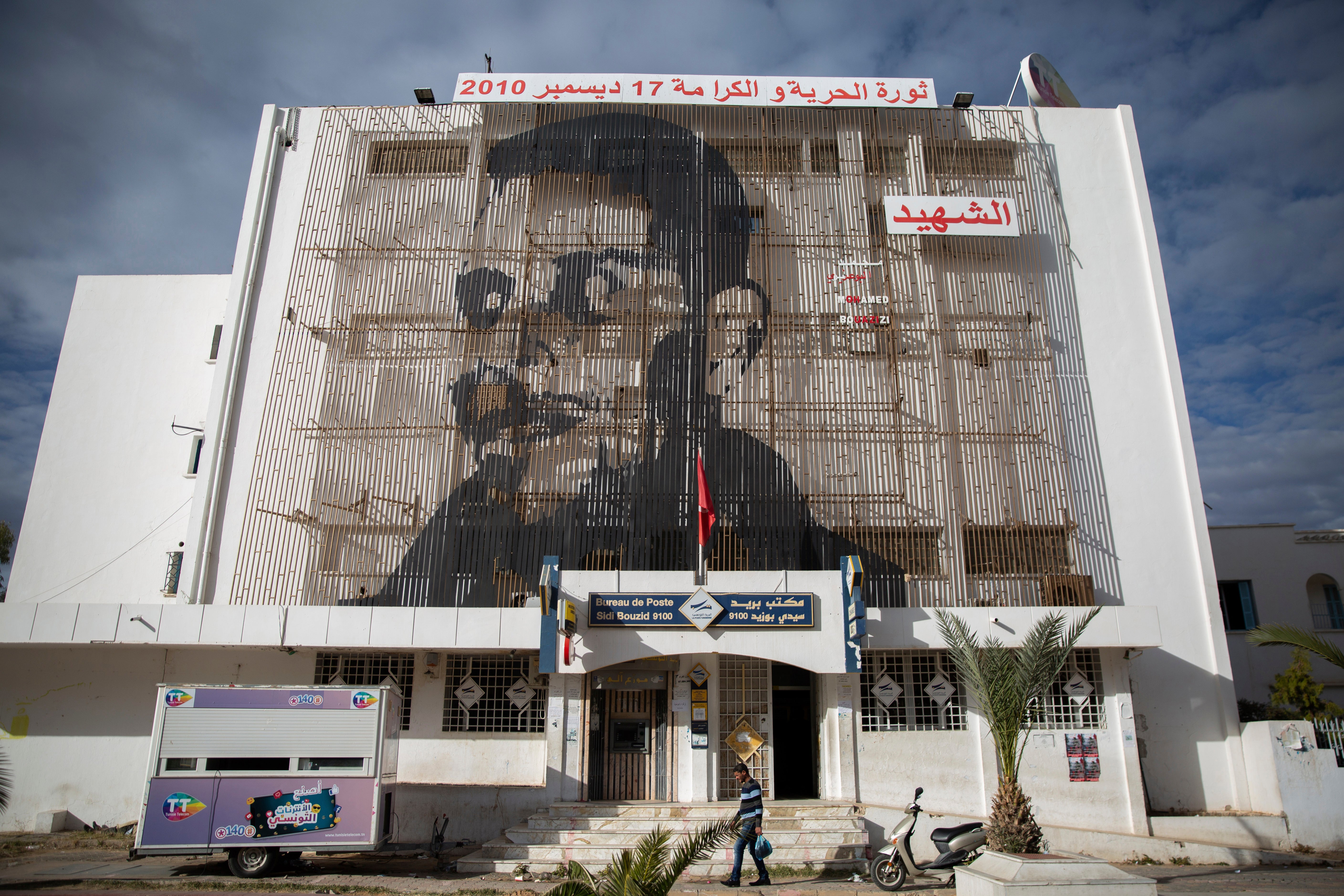 Mohammed Bouazizi depicted on the facade of post office in Sidi Bouzid