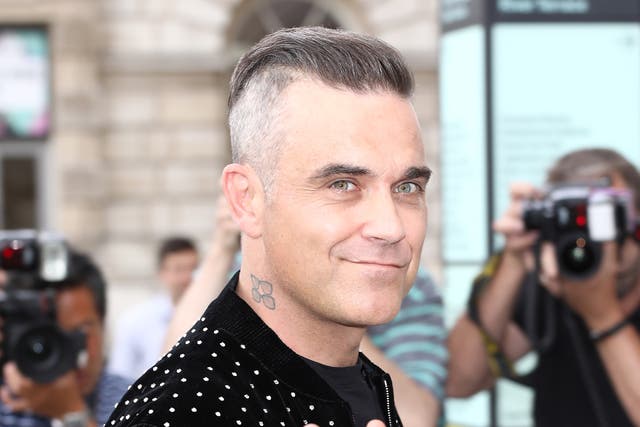 <p>Robbie Williams</p>