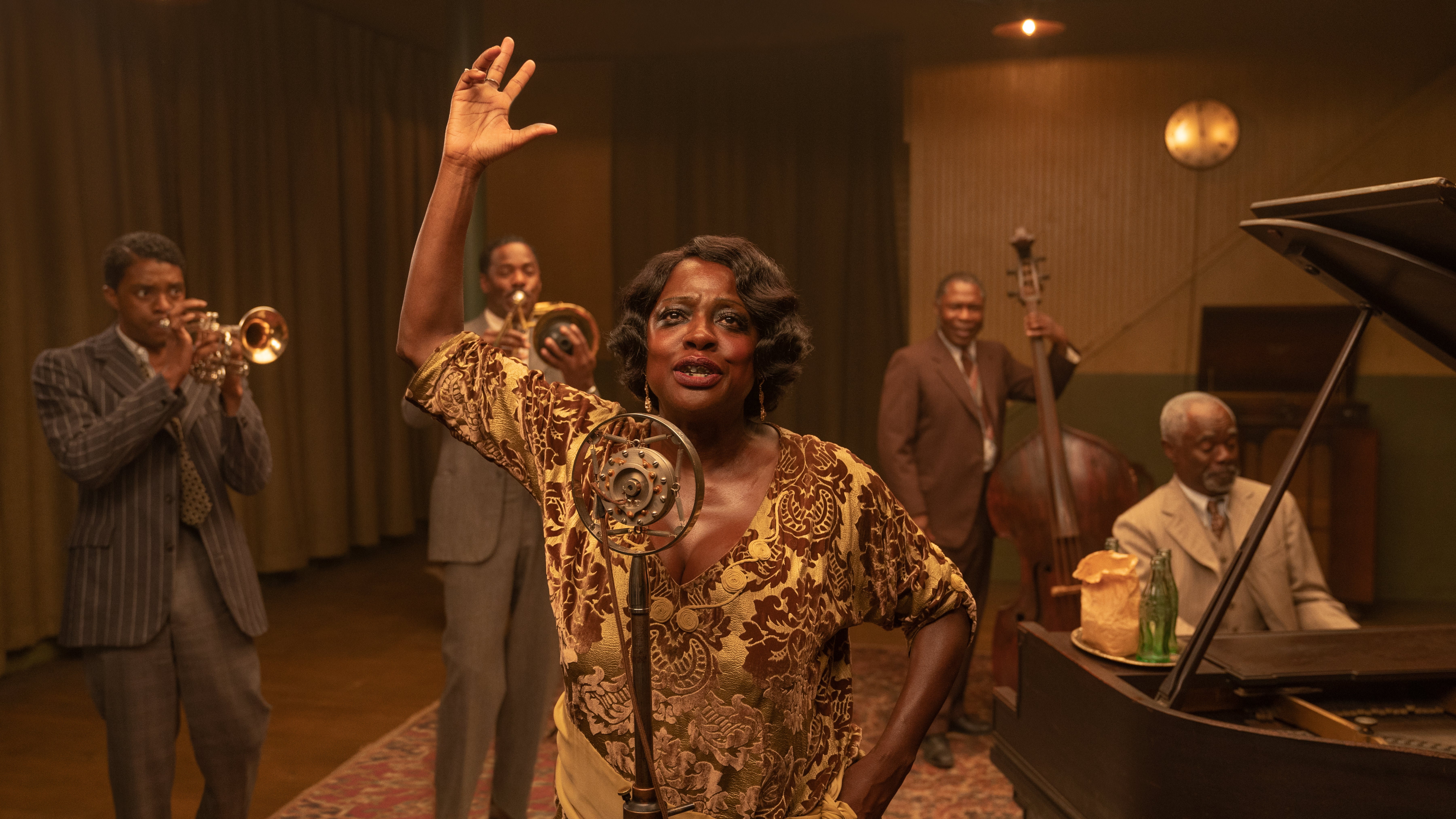 Viola Davis, as Ma Rainey, burns through the pageantry, her ferocity only dulled by the occasional wave of exhaustion