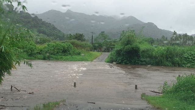The Bagata Crossing is seen flooded on Vunivesi Road in Savusavu, as Cyclone Yasa passes through Fiji.