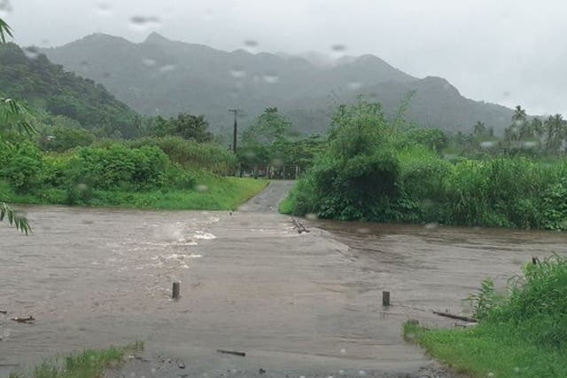 The Bagata Crossing is seen flooded on Vunivesi Road in Savusavu, as Cyclone Yasa passes through Fiji.