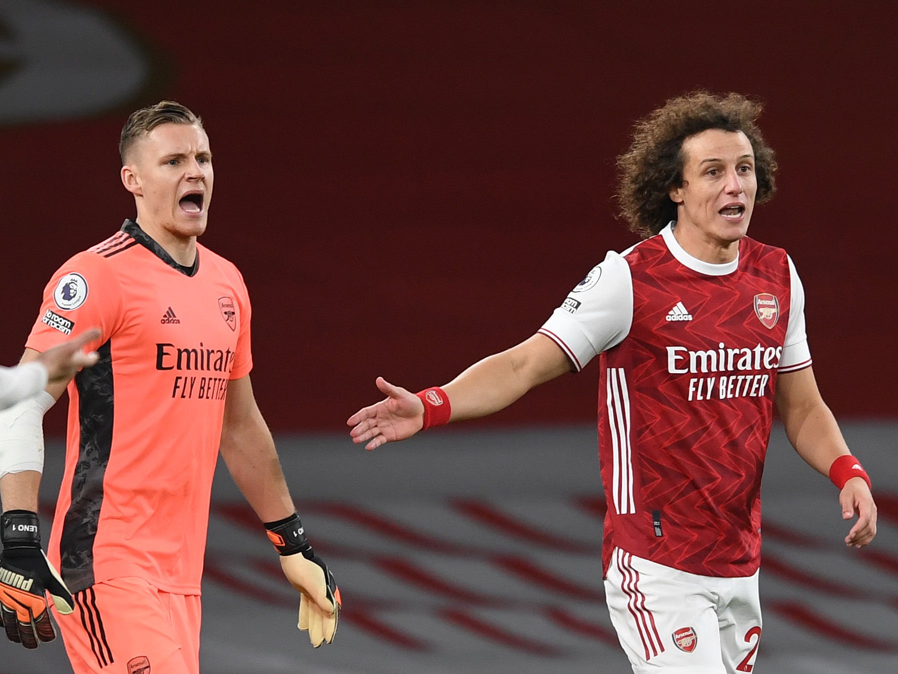 Leno (left) claims Arsenal must improve despite reaching the Europa League quarter-finals