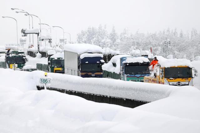 <p>Vehicles are stranded on the snow-covered Kanetsu expressway in Minamiuonuma in Niigata Prefecture, Japan&nbsp;</p>