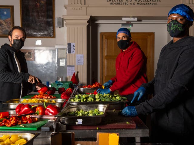 <p>Evgeny Lebedev, Craig David and KSI prepare meals at Scottish House, Westminster</p>