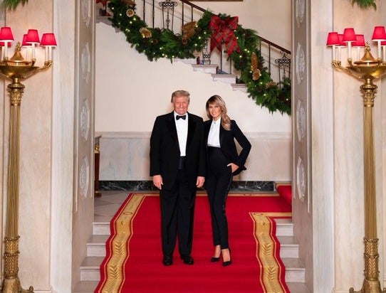 Donald and Melania Trump wear matching tuxedos in their final Christmas card from the White House