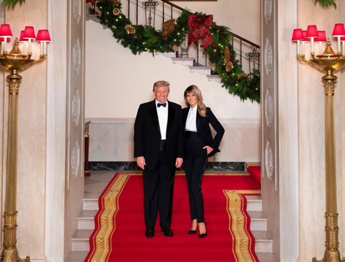 Donald and Melania Trump wear matching tuxedos in their final Christmas card from the White House