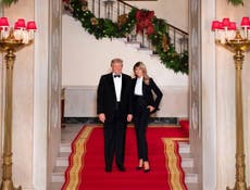 Trumps wear matching tuxedos in final Christmas card from White House