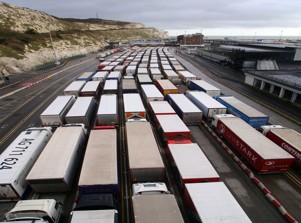 Lorries queue on 18 December to enter The Port of Dover in Kent as the clock ticks down on the chance for the UK to strike a deal before the end of the Brexit transition period on December 31. 