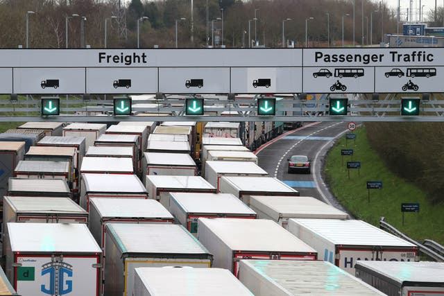 Lorries queue to enter the Eurotunnel site in Folkestone, Kent, due to heavy freight traffic on 18 December 2020.