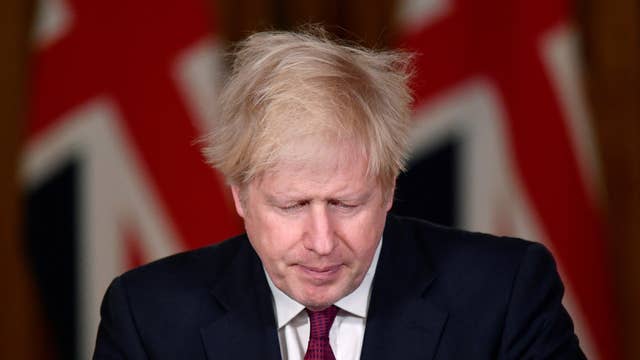 Prime Minister Boris Johnson speaks during a news conference in response to the ongoing situation with the coronavirus disease pandemic, inside 10 Downing Street, London. He announced London and southeast England set for tier 4 rules with Christmas bubbles canceled