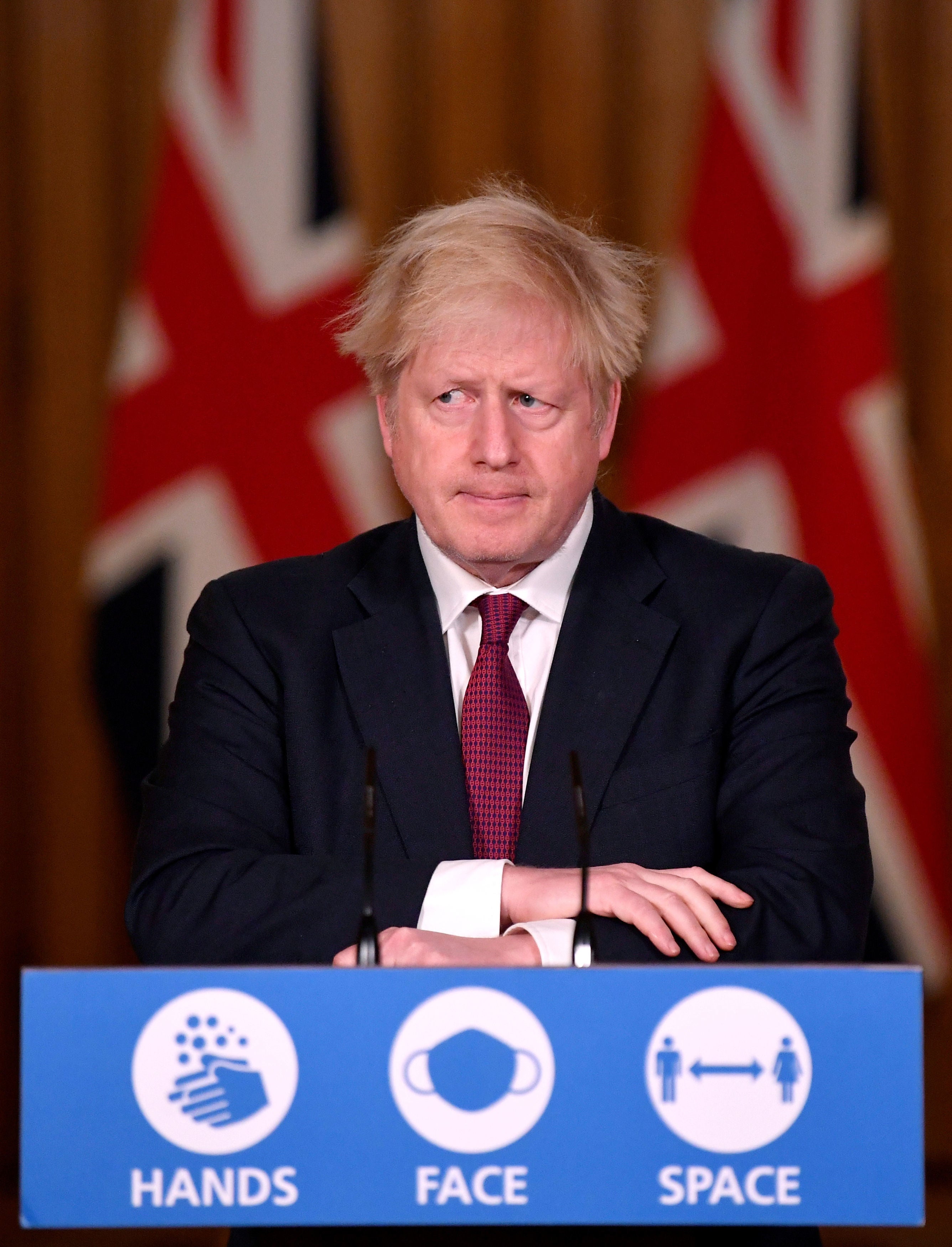 Boris Johnson at his lecturn where he announced stricter Covid rules in December 2020