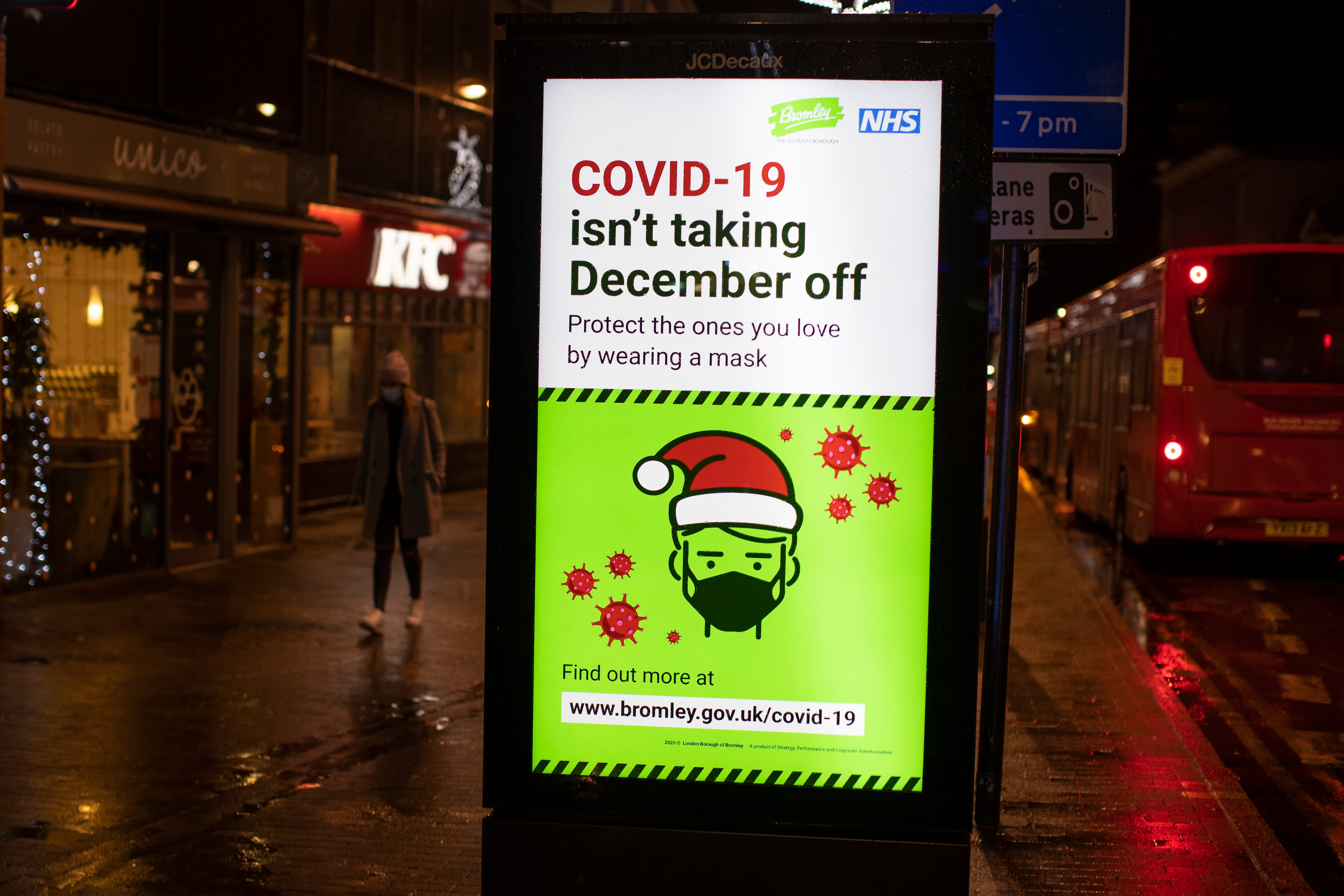 A sign warns shoppers about the risks of Covid-19 in Bromley
