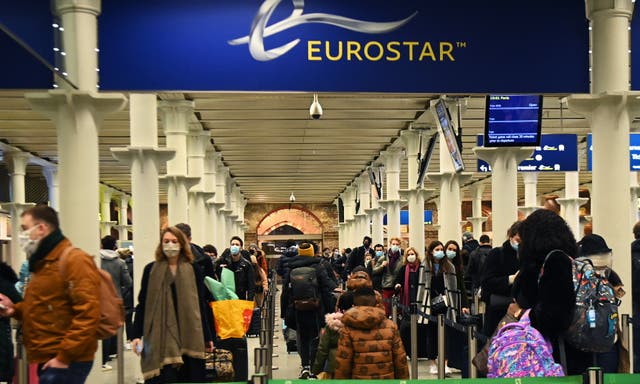 Passengers queue to board the Eurostar to Paris from Kings Cross St Pancras, shortly before France shuts its border to the UK at midnight on 20 December, 2020. 