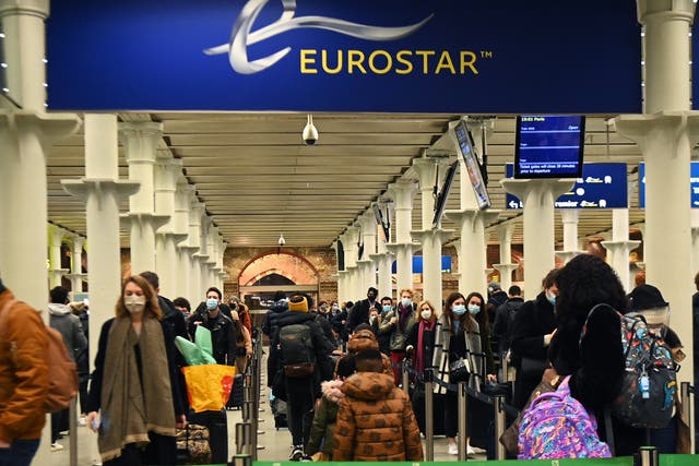 Passengers queue to board the Eurostar to Paris from Kings Cross St Pancras, shortly before France shuts its border to the UK at midnight on 20 December, 2020. 