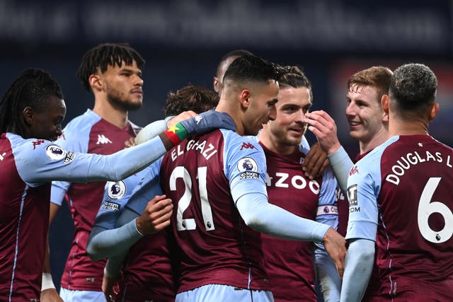 <p>Anwar El Ghazi (centre) started and ended the match by scoring for Aston Villa</p>