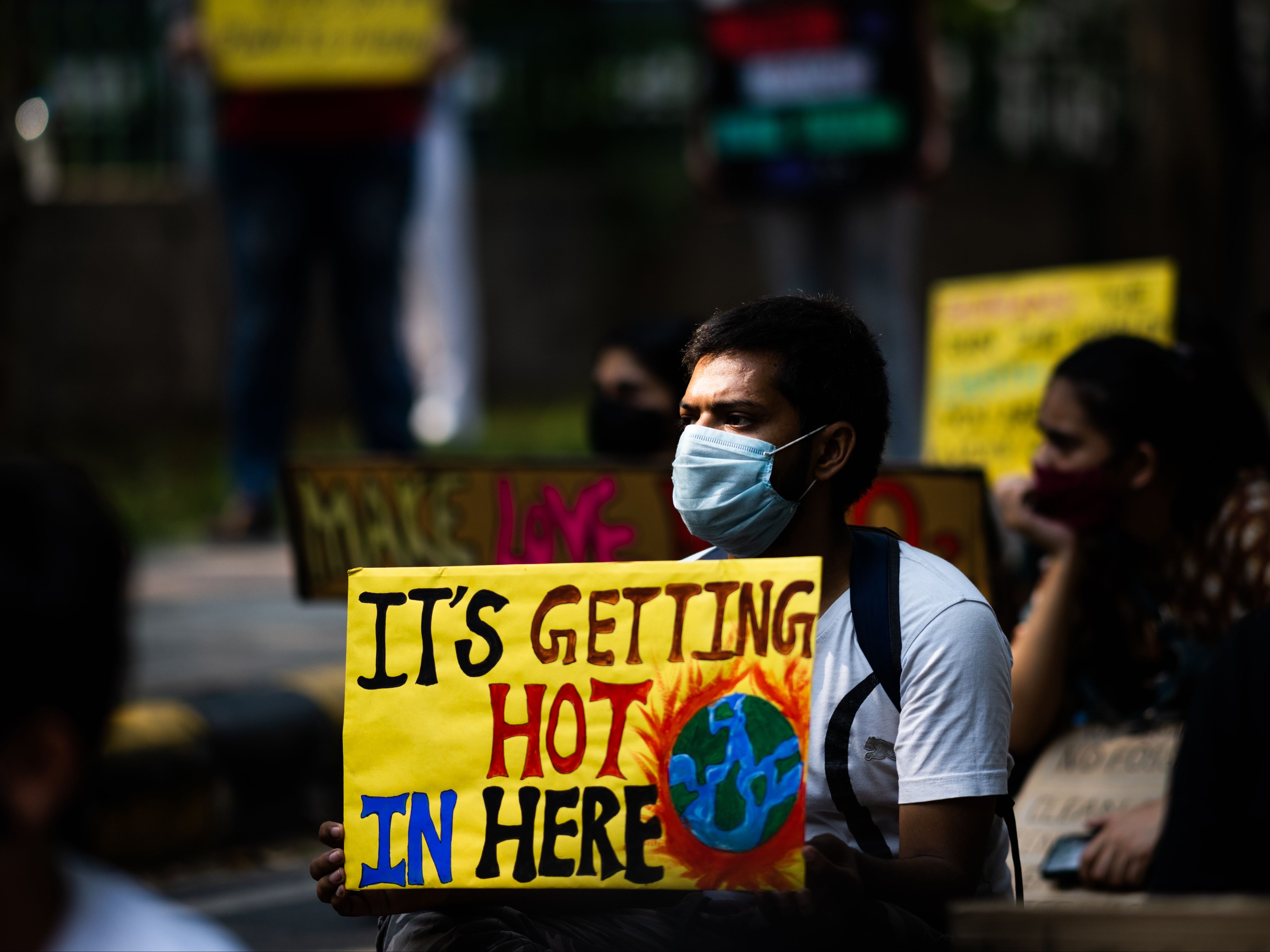 Fridays for Future protester holds sign reading ‘It’s getting hot in here’ &nbsp;during the global climate strike in Delhi in September&nbsp;