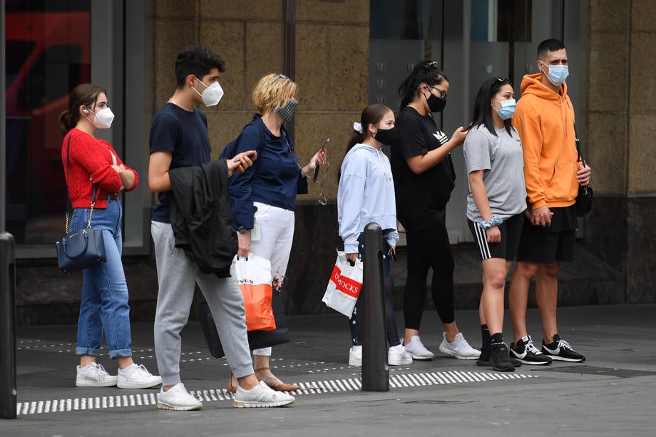 People wear masks in Sydney, Australia