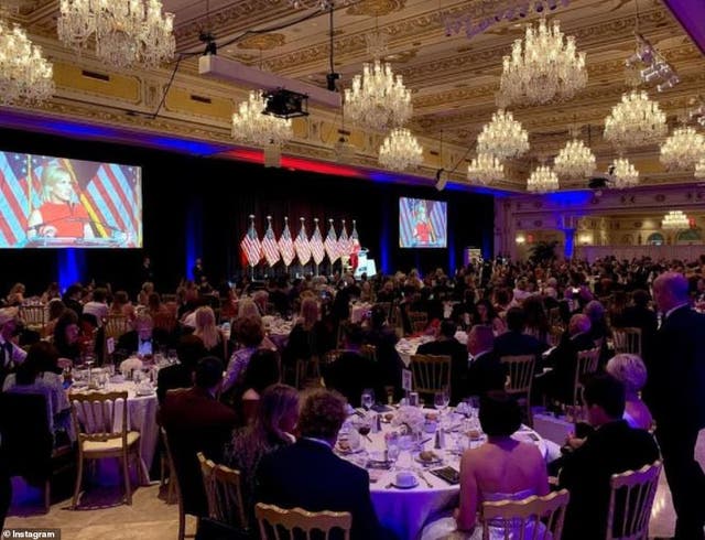 A TurningPoint USA ball at Donald Trump’s Mar-a-Lago resort in Florida, where attendees - mostly mask-less - gathered at 10 person tables to hear conservative personalities speak. 