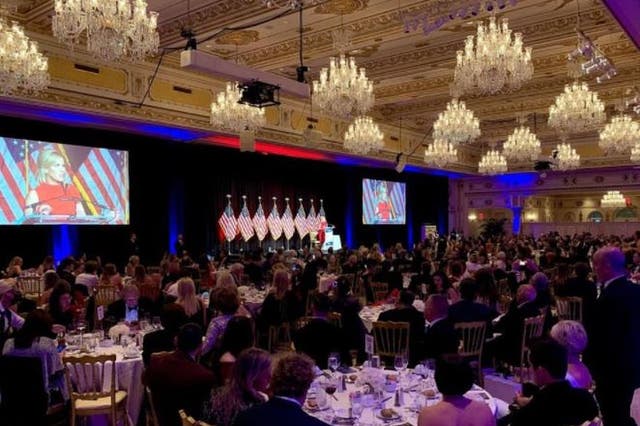 A TurningPoint USA ball at Donald Trump’s Mar-a-Lago resort in Florida, where attendees - mostly mask-less - gathered at 10 person tables to hear conservative personalities speak. 