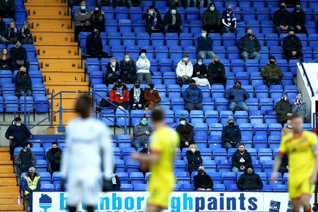<p>Tranmere fans watch the action from the stands during the Sky Bet League Two match at Prenton Park, Birkenhead</p>