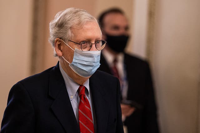 Senate Majority Leader Mitch McConnell (R-KY) walks to open up the senate on Capitol Hill on 20 December 2020 in Washington, DC