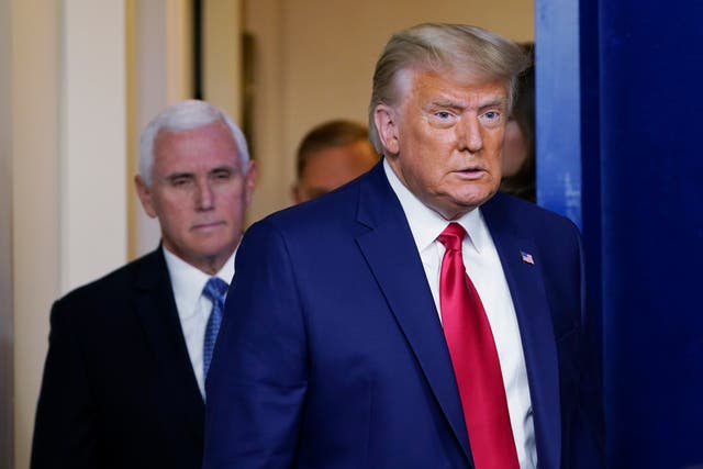 <p>President Donald Trump walking out to speak in the Brady Briefing Room in the White House, Tuesday, Nov. 24, 2020, in Washington. Walking behind Trump is Vice President Mike Pence.&nbsp;</p>