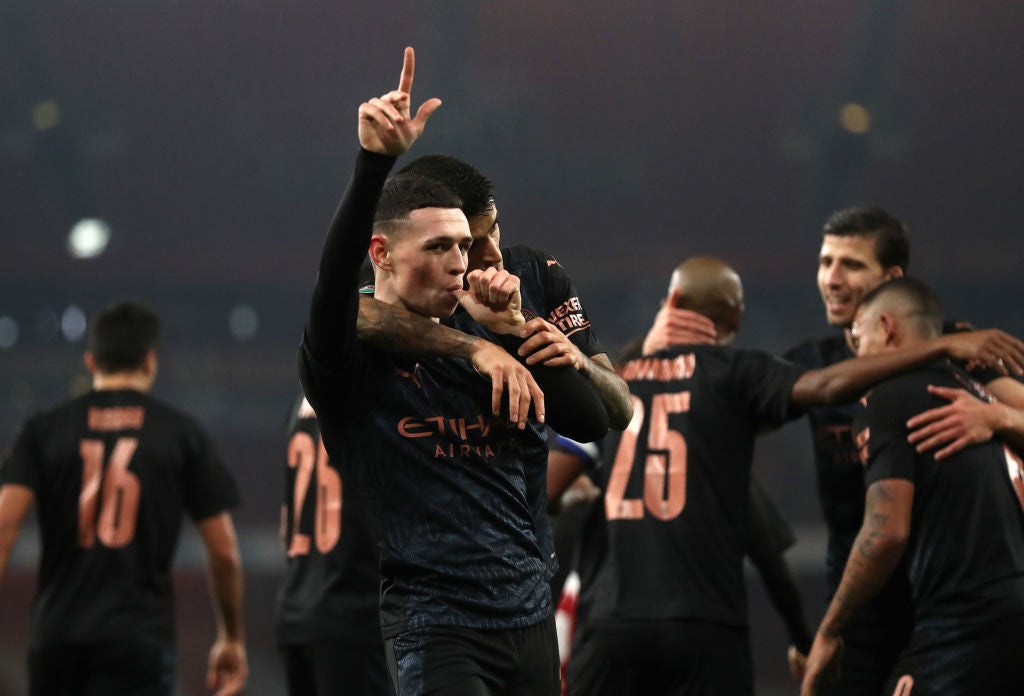 Phil Foden scores as Man City cruise past Arsenal in the quarter-finals