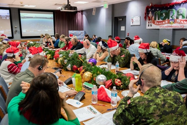 Volunteers at NORAD on Christmas Eve
