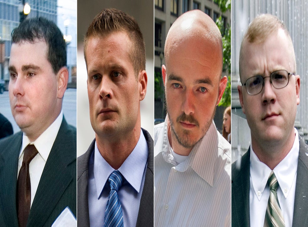 Blackwater guards, from left, Dustin Heard, Evan Liberty, Nicholas Slatten and Paul Slough. On Tuesday, Dec. 22, 2020, President Donald Trump pardoned 15 people, including Heard, Liberty, Slatten and Slough, the four former government contractors convicted in a 2007 massacre in Baghdad that left more a dozen Iraqi civilians dead and caused an international uproar over the use of private security guards in a war zone. (AP Photo/File)