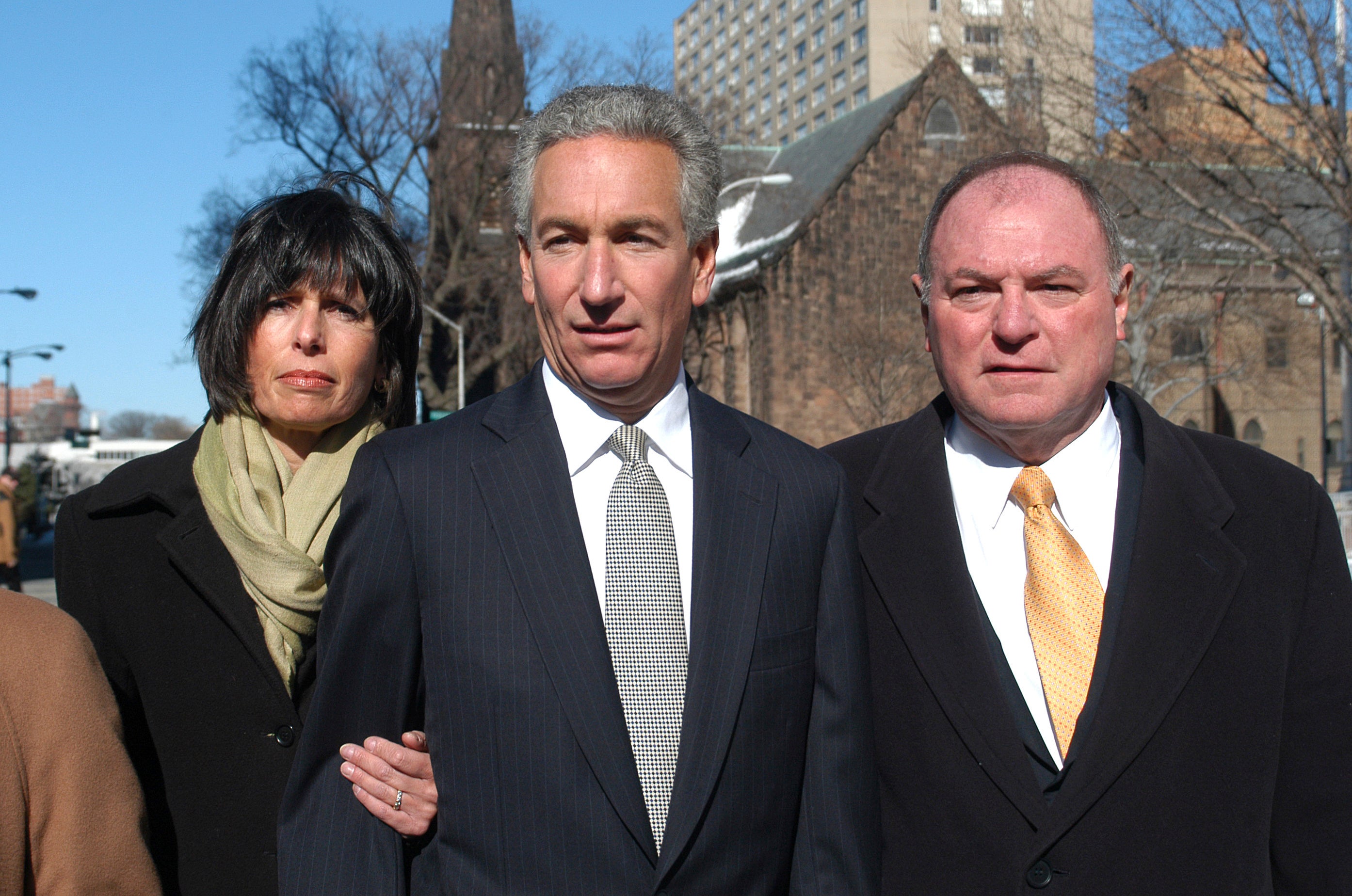 Charles B Kushner, flanked by his wife, Seryl Beth, and his attorney Alfred DeCotiis, arrives at the Newark Federal Court for sentencing in March 2005