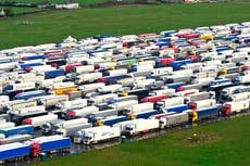 Snow falls in UK as severe flooding disrupts festive plans