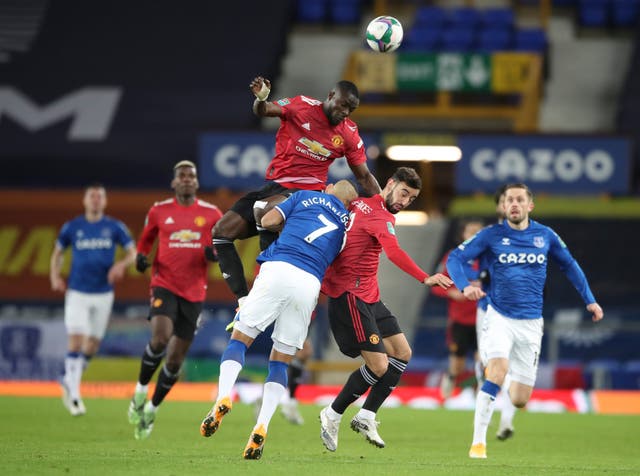 Richarlison was forced off the field after a collision with Eric Bailly and Bruno Fernandes