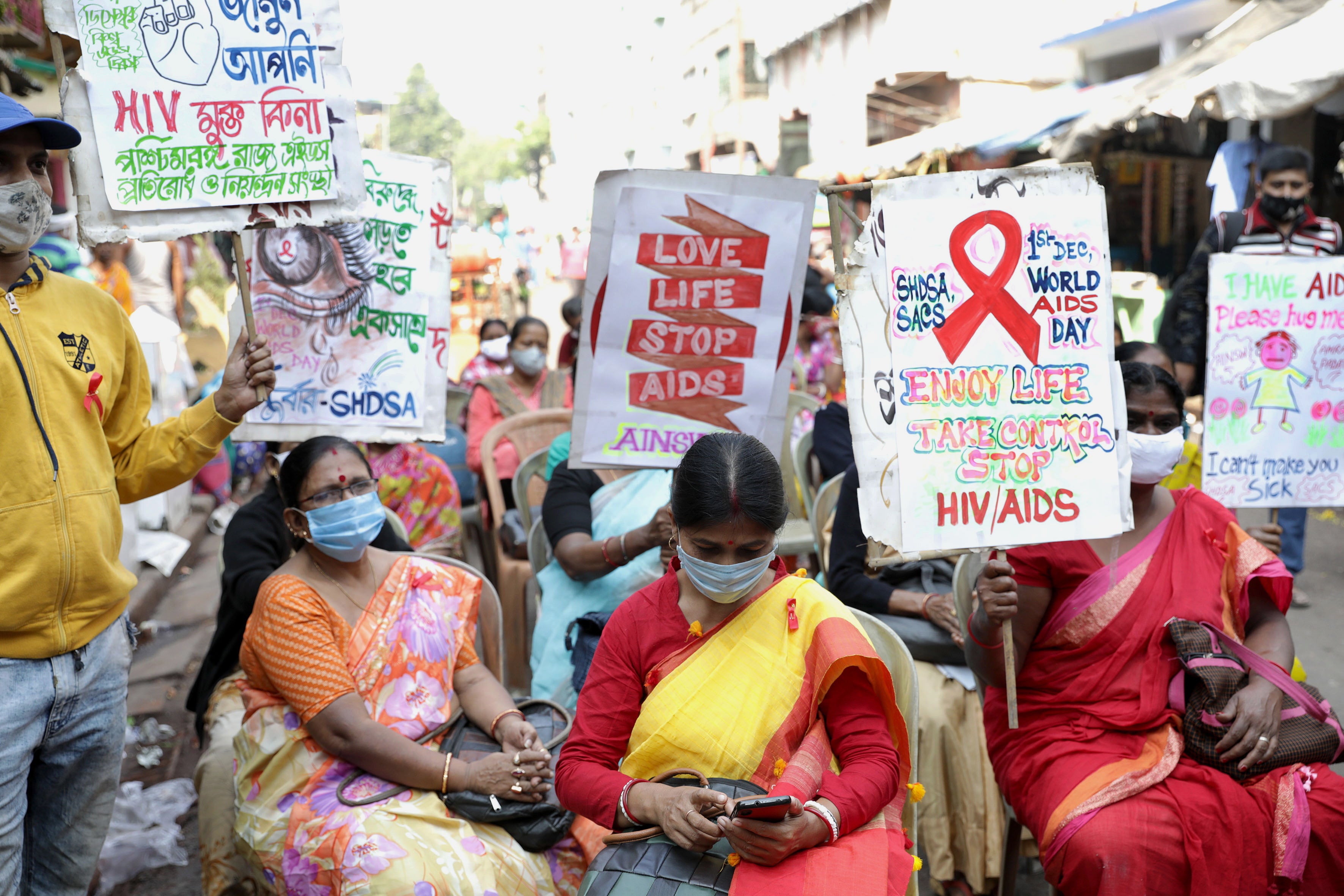 Demonstrators and Indian sex workers on World Aids Day earlier this month