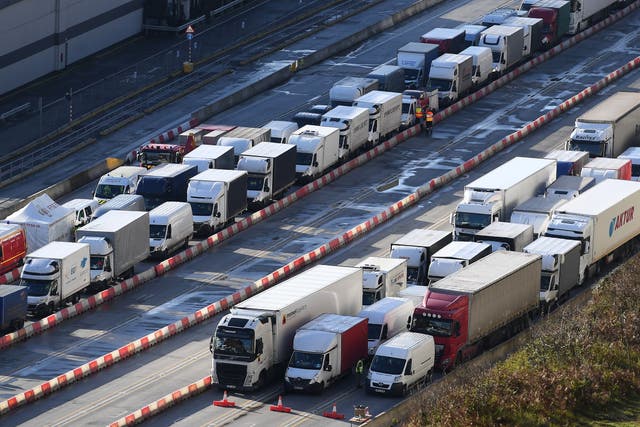 <p>Trucks queue up at the Port of Dover on 24 December after France reopened its border with the UK</p>