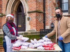 Charities on the front line hand out meals and gifts over Christmas