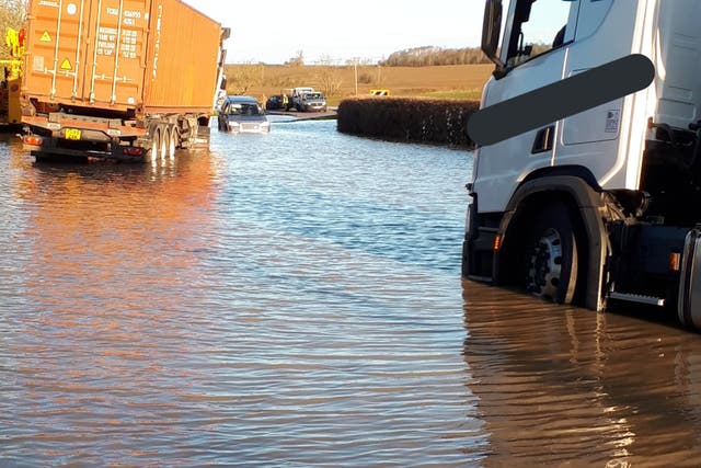 <p>Flooding on the B645 road in Stonely, Cambridgeshire on Christmas Eve</p>