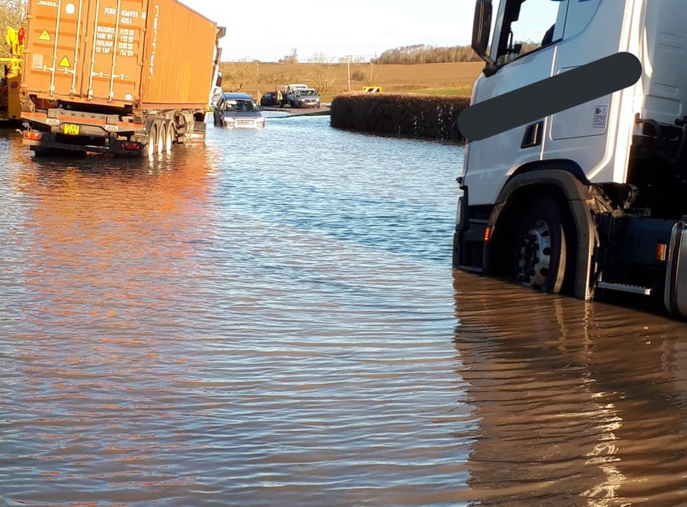 <p>Flooding on the B645 road in Stonely, Cambridgeshire on Christmas Eve</p>