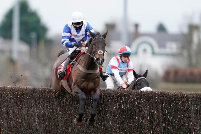 Frodon clears a fence on his way to victory with Bryony Frost in the King George VI Chase at Kempton