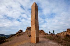 Gingerbread monolith held together with icing  and gumdrops appears in San Francisco 