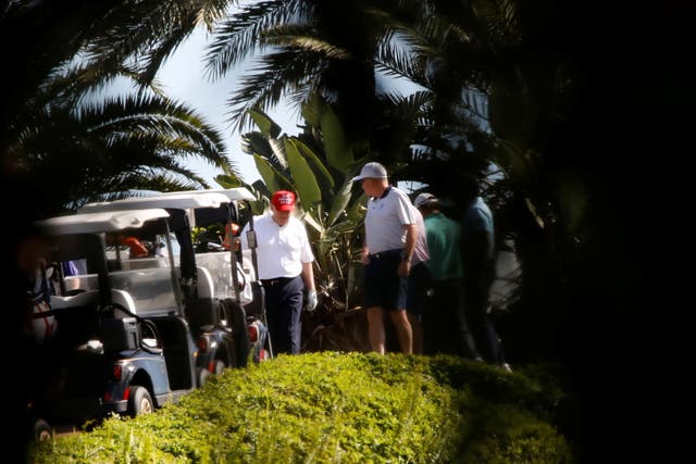  President Donald Trump plays golf at the Trump International Golf Club in West Palm Beach, Florida, U.S., December 27, 2020